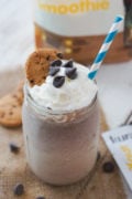 A chocolate chip cookie smoothie topped with whipped cream.