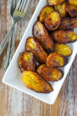 Fried sweet plantains served on a white plate