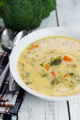 A simple cheese broccoli soup recipe that is easy to make and filled with delicious cheddar cheese, broccoli and carrots. mydominicankitchen.com #soup