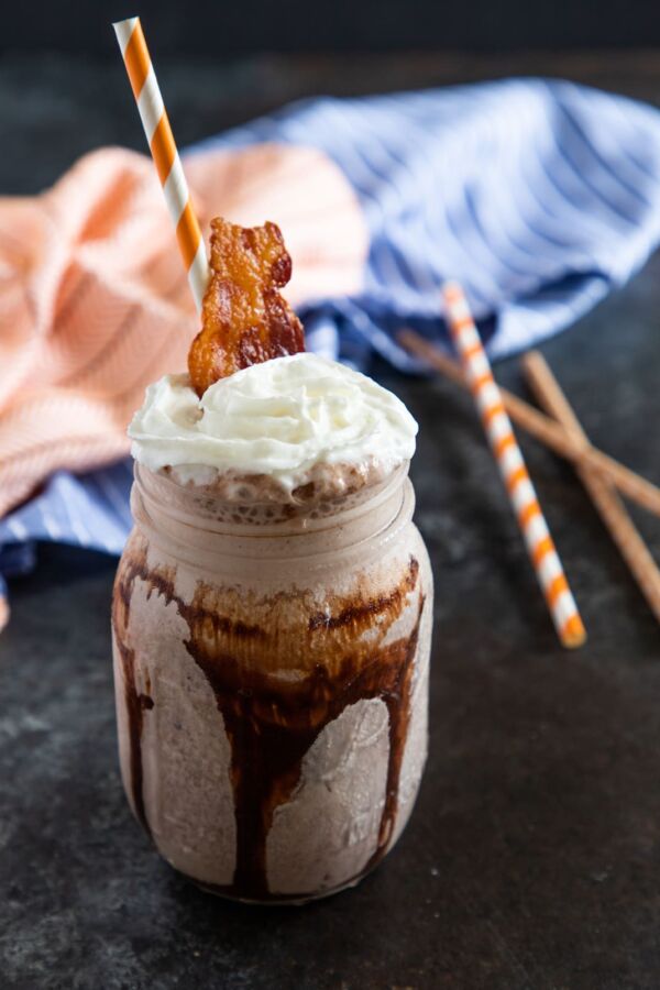 Black and White Bourbon Shake with Bacon made with vanilla and chocolate ice cream, bourbon, milk and topped with crispy bacon. - Smart Little Cookie