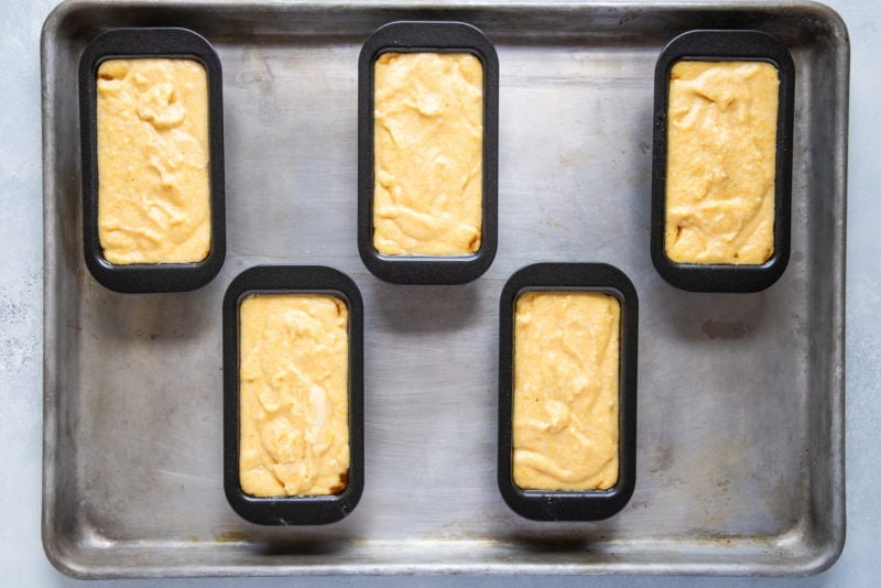 Cornmeal batter in baking tins.