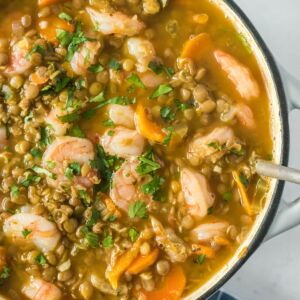 lentil stew with shrimp in a dutch oven