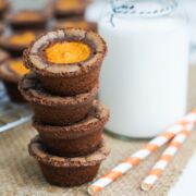 stocked brownie bites with a glass of milk