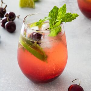 cherry mojito in a cocktail glass