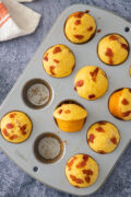 mini bacon corn muffins in the muffins pan 